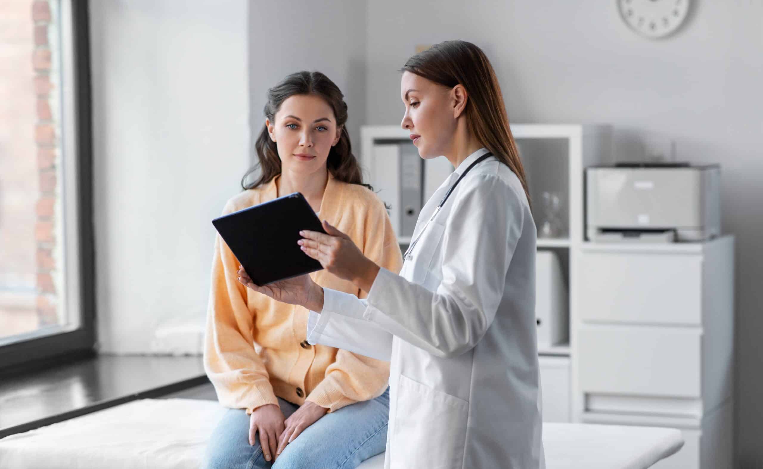 Medicine,,Healthcare,And,People,Concept,-,Female,Doctor,With,Tablet